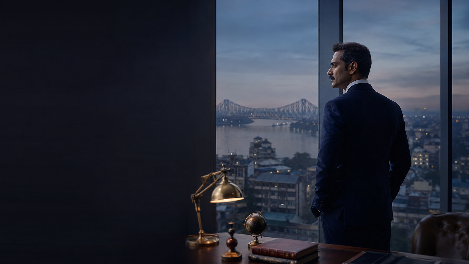 Discreet private investigator overlooking Kolkata at night